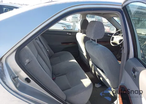 2002 Toyota Camry Xle z USA, uszkodzony, nr VIN 4T1BE30K62U060918